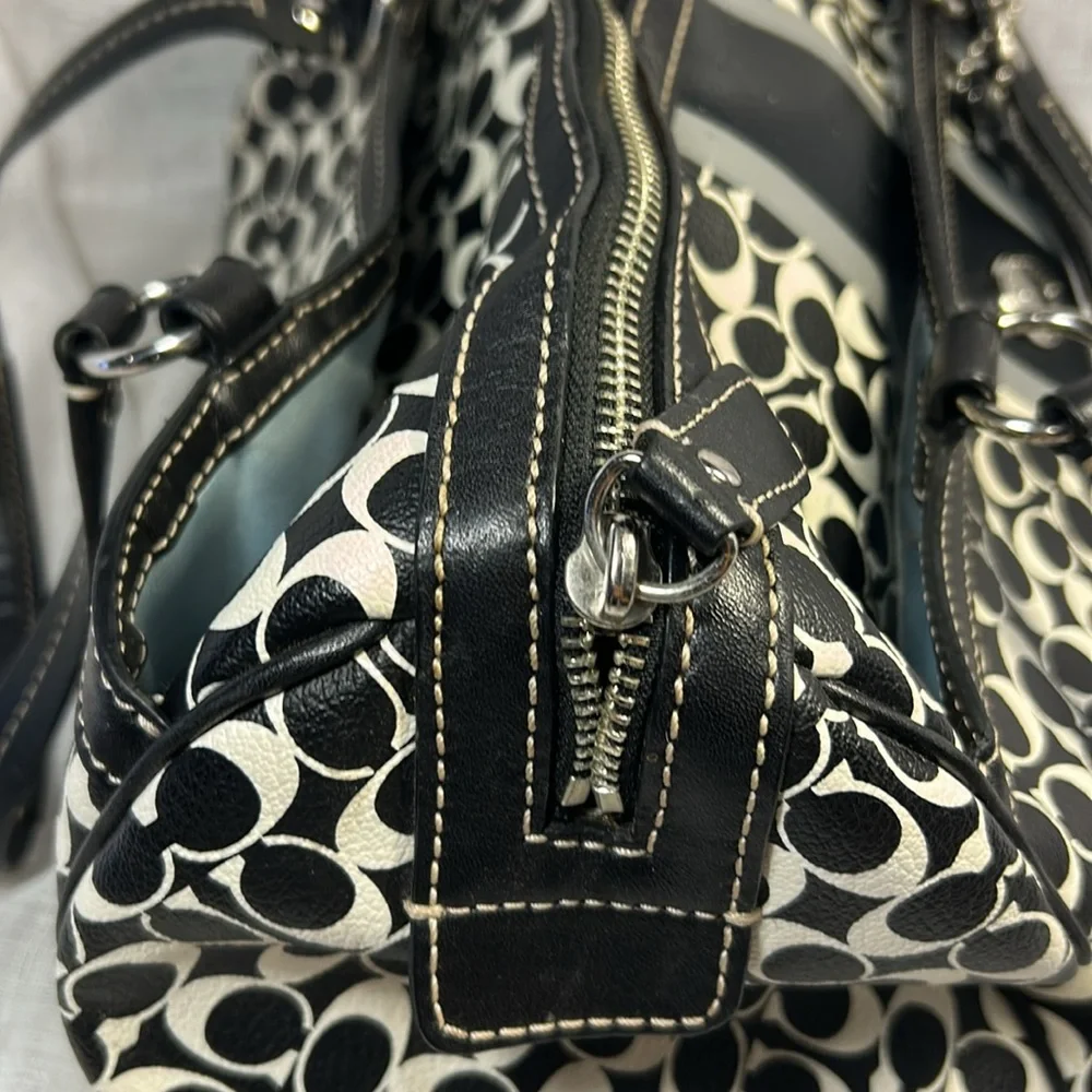 Coach boston leather travel bag with a tag